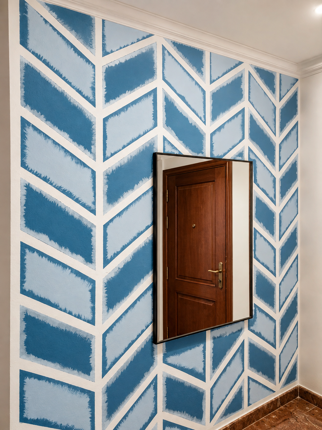 Pintura decorativa en la entrada de una vivienda de Zaragoza