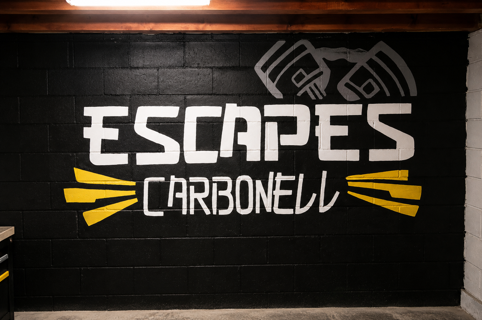 Pintura del logotipo de Escapes Carbonell en Zaragoza